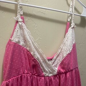 Pink and white slip dress with lace detailing and adjustable straps